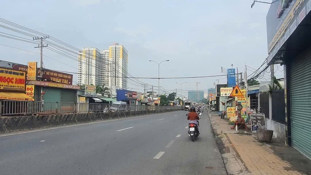 mặt tiền ql1k dĩ an