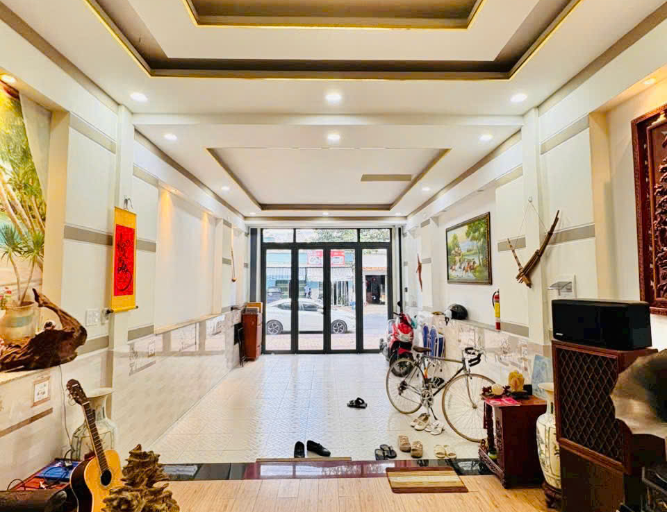 nhà mặt tiền kd dĩ an