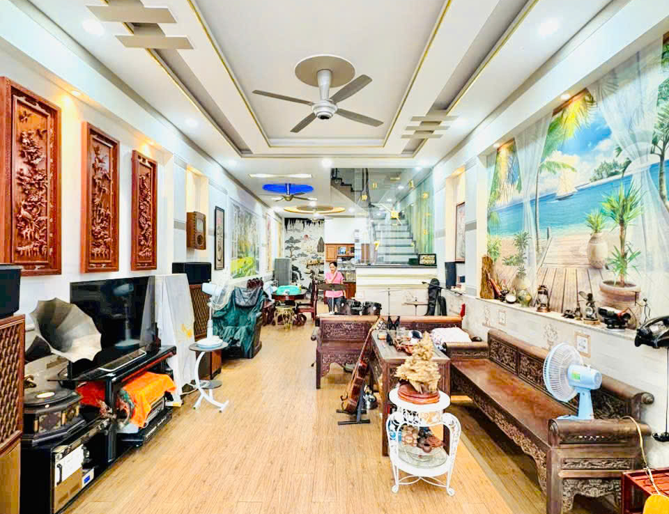 nhà mặt tiền kd dĩ an