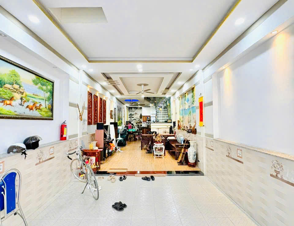 nhà mặt tiền kd dĩ an